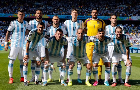 Argentina pose for a team photo before the group F World Cup soccer match between Argentina and Iran at the Mineirao Stadium in Belo Horizonte, Brazil, Saturday, June 21, 2014. (AP Photo/Victor R. Caivano) ORG XMIT: WCTH116